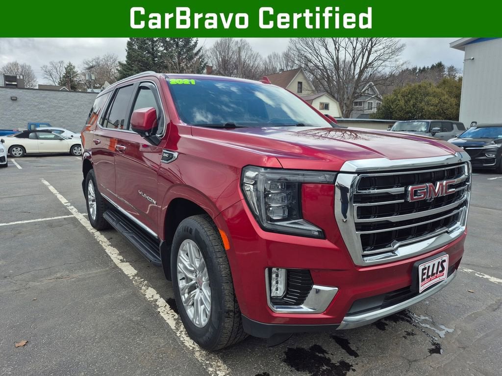2021 GMC Yukon SLT in Cayenne Red Tintcoat — front three-quarter view