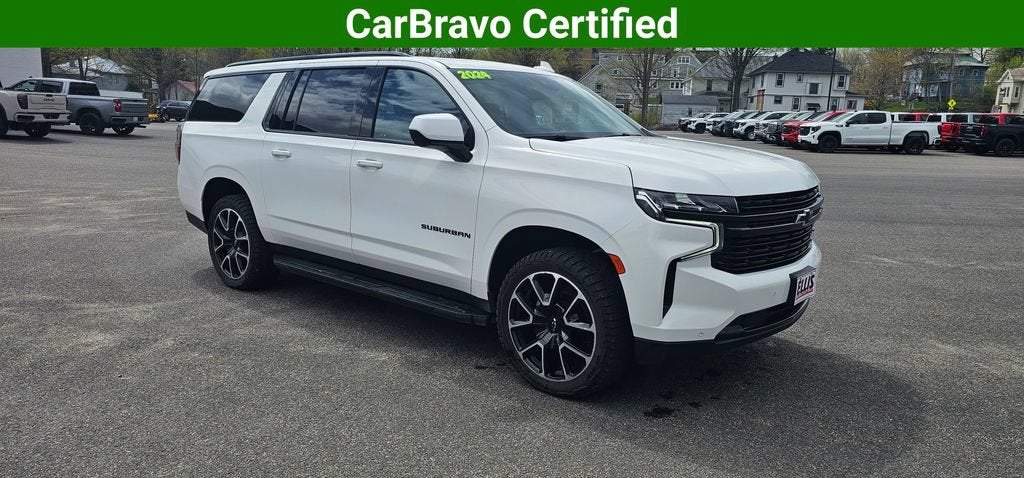 2024 Chevrolet Suburban RST in Summit White — front three-quarter view