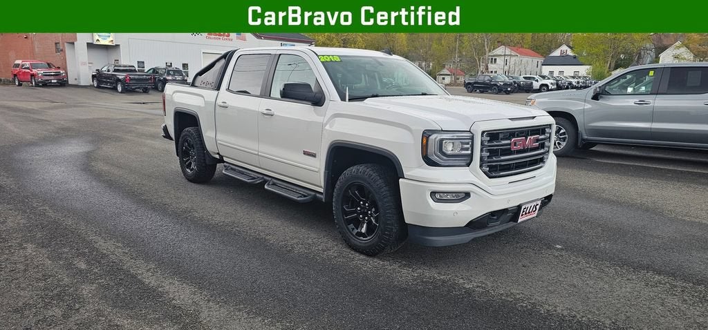 2018 GMC Sierra 1500 SLT in Summit White — front three-quarter view